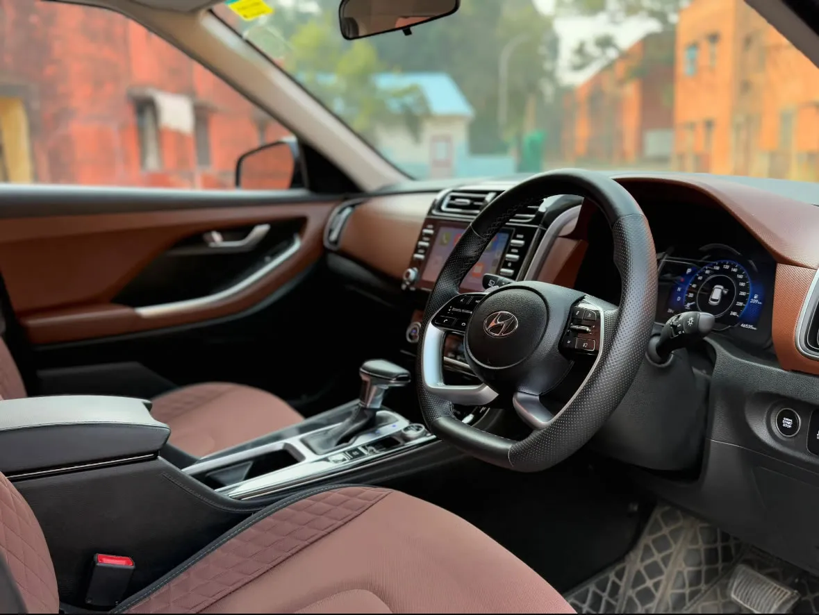 Interior of the Hyundai Alcazar, showing the comfortable seating. Rent this 6-seater in Goa.