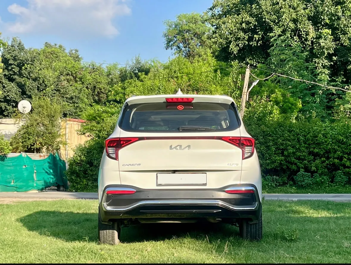 Rear view of the KIA Carens automatic, a reliable car for rent in Goa.
