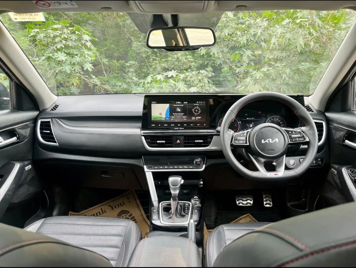 Interior of the KIA Seltos, highlighting the comfortable cabin. Book this car for your Goa trip.