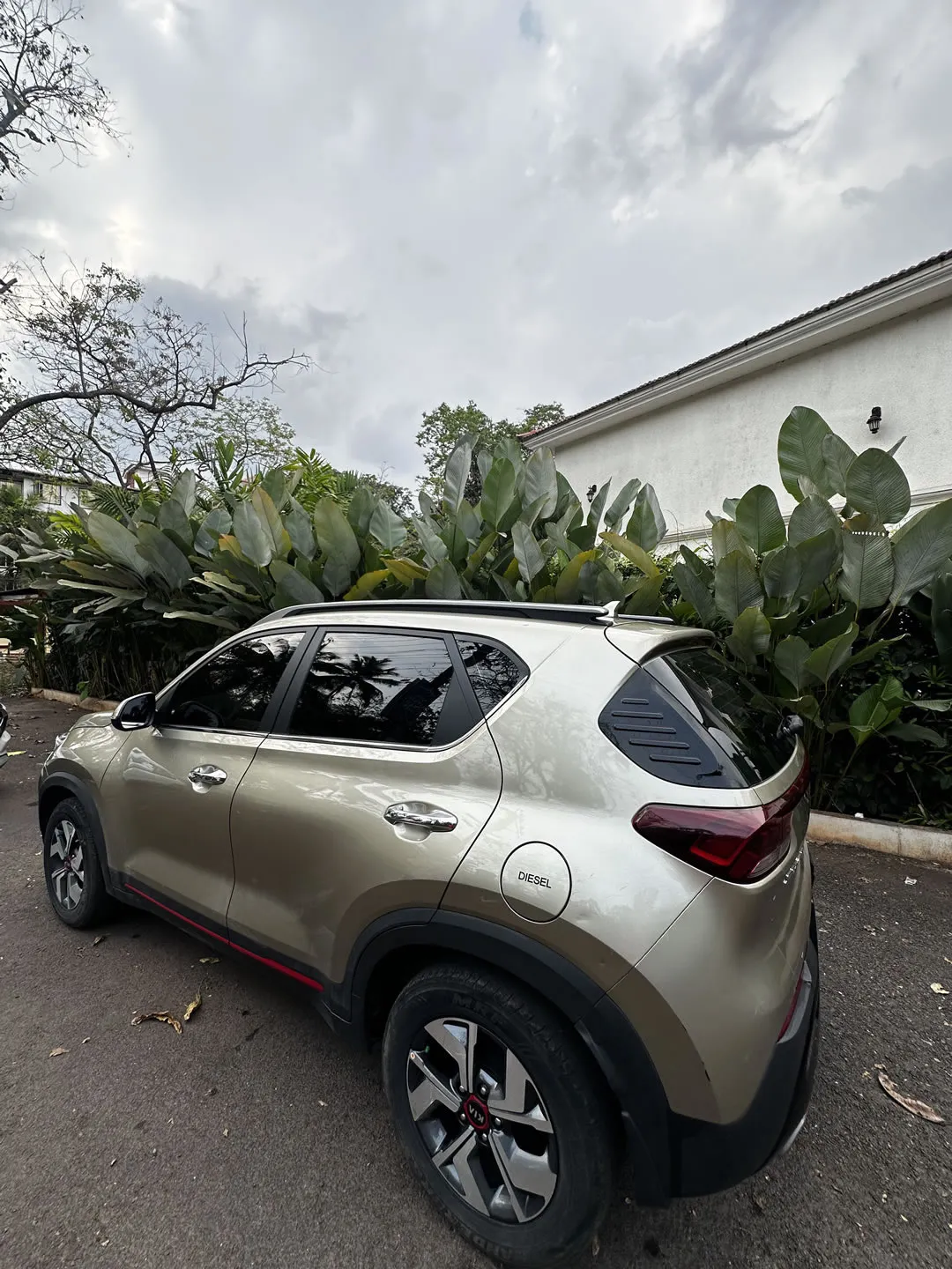 Dynamic left view of the Kia Sonet Sunroof, ideal for self-drive car rentals in Goa.
