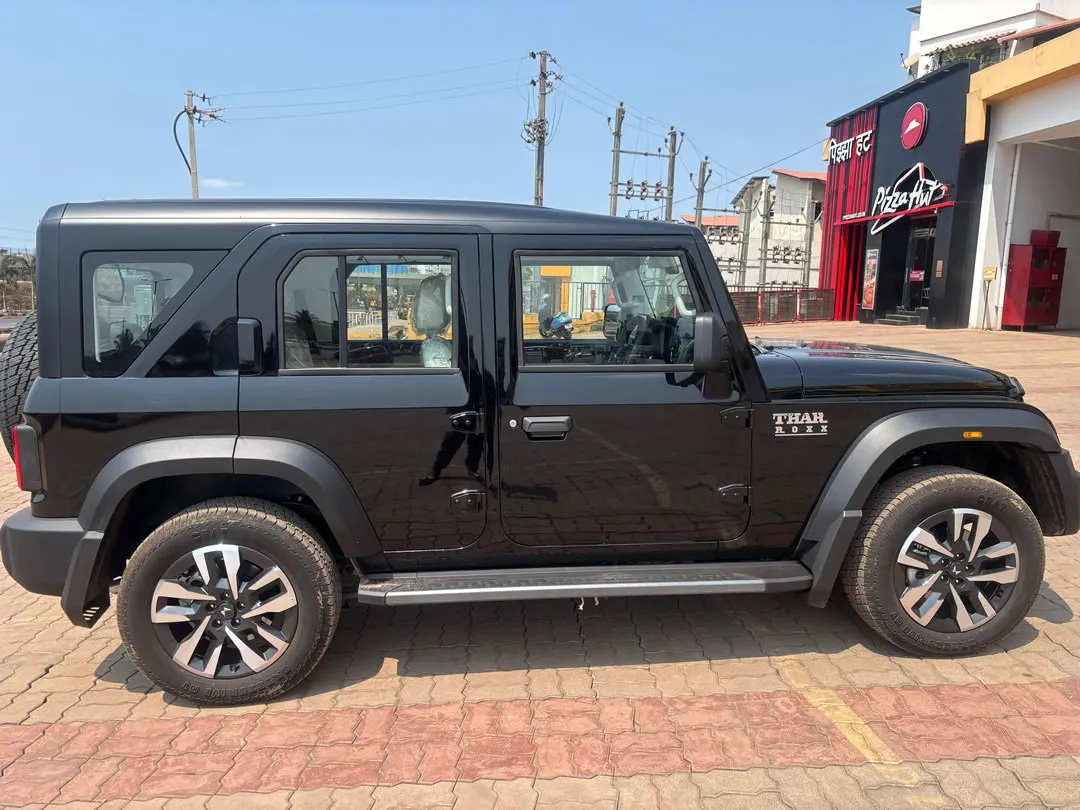 Right side view of the Mahindra Thar ROXX, an exciting self-drive car rental in Goa.