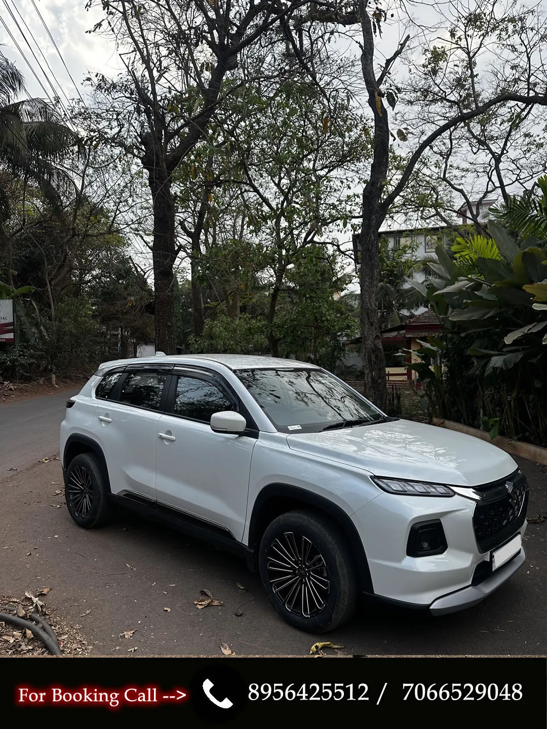 Left side view of the Maruti Grand Vitara, perfect for your self-drive trip in Goa.