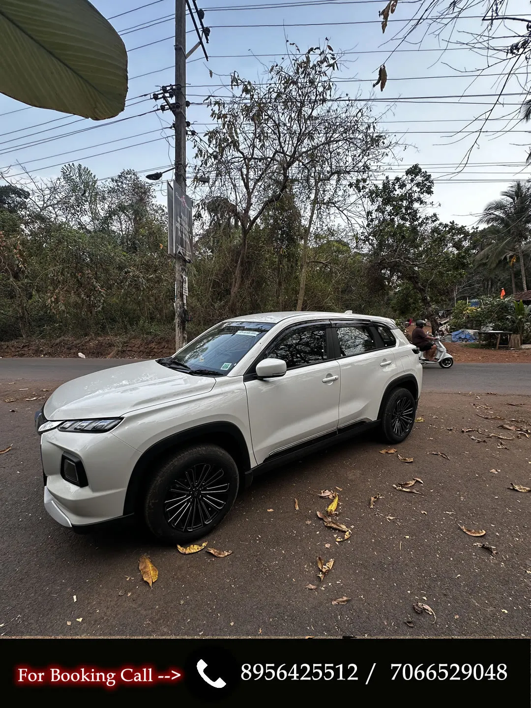 Side profile of the Maruti Grand Vitara, a manual Compact SUV available for rent in Goa.