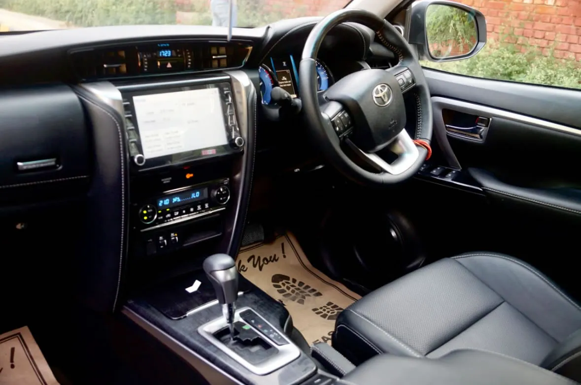 Interior of the Toyota Fortuner, book this automatic SUV for a premium experience in Goa.