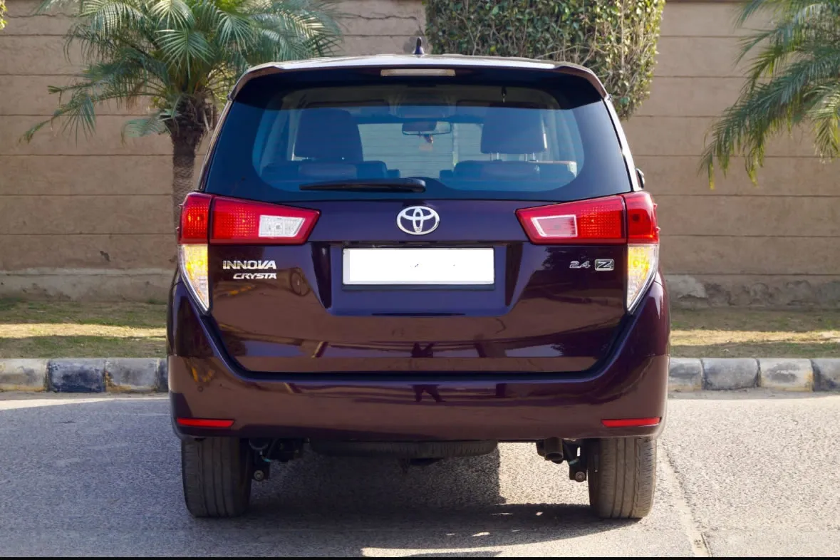Rear view of the Toyota Innova Crysta, a top choice for large groups on a Goa trip.